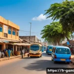 감비아의 인프라 발전 상황 - A vibrant urban street scene in Banjul, The Gambia, showing newly paved roads bustling with minibus ...