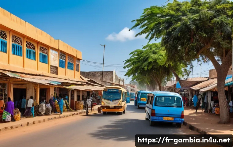 감비아의 인프라 발전 상황 - A vibrant urban street scene in Banjul, The Gambia, showing newly paved roads bustling with minibus ...